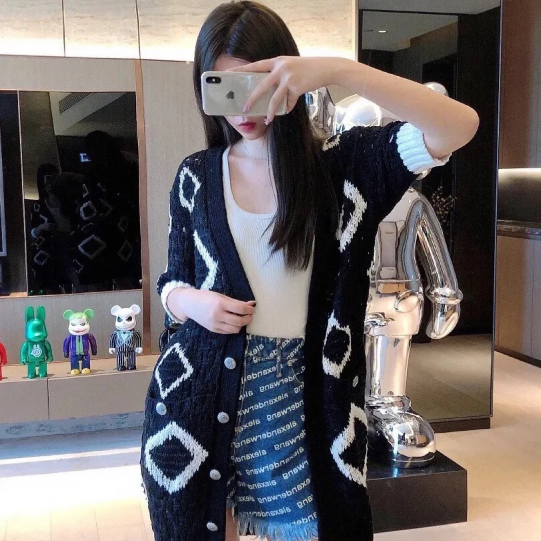99新 Chanel/香奈儿 D500861/黑色几何图案中长款短袖毛衣裙/34码