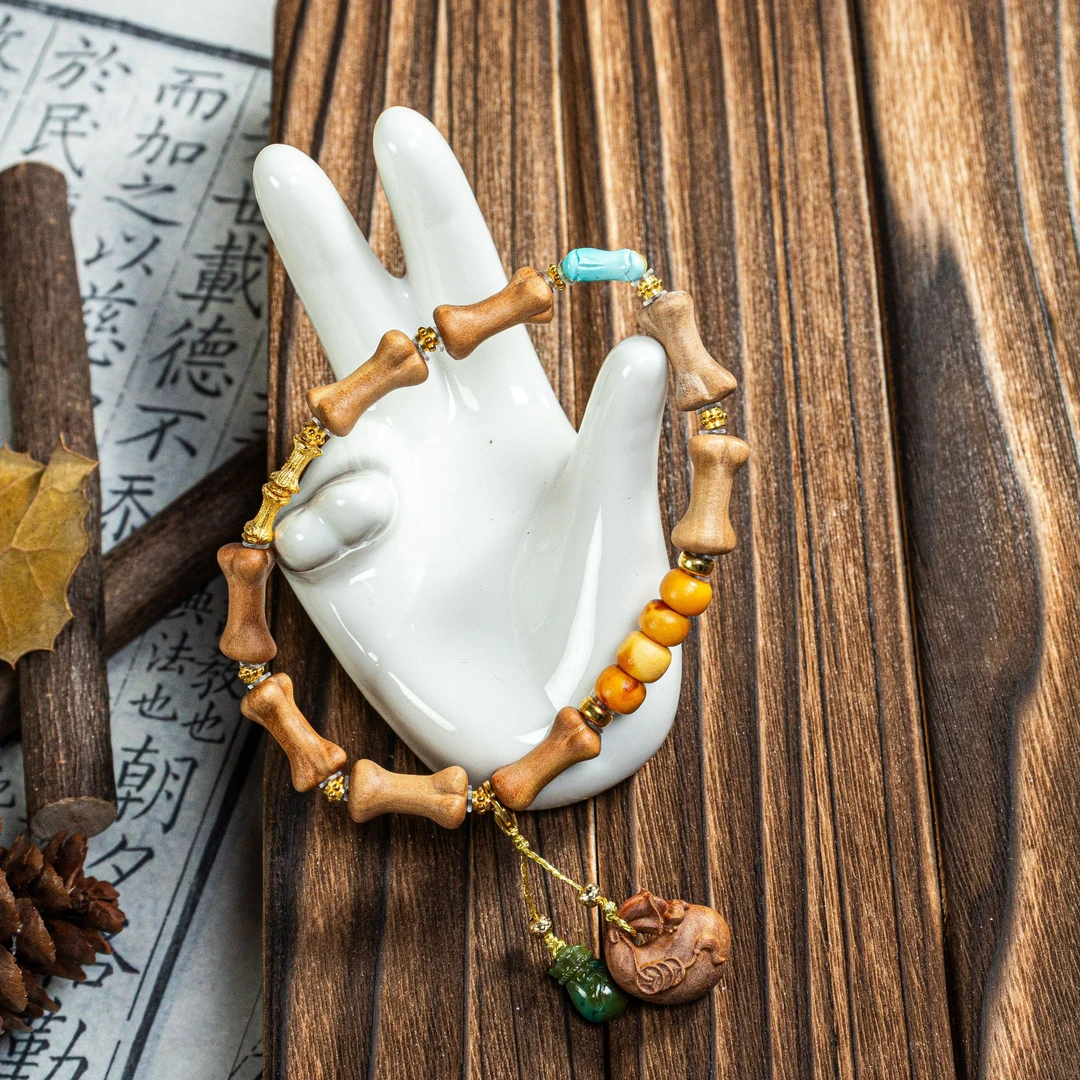 【壹芳珠宝】天然老山檀骨头手串