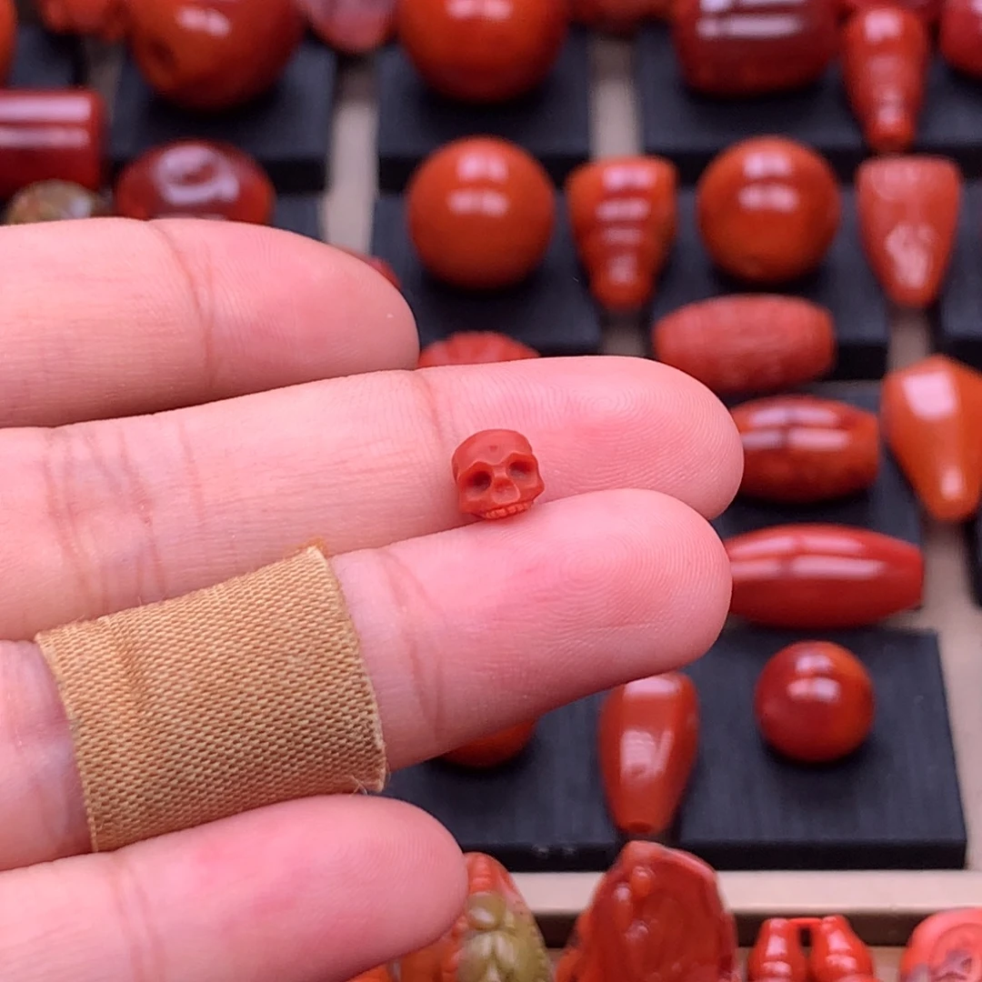南红玛瑙未镶嵌原矿骷髅头6mm