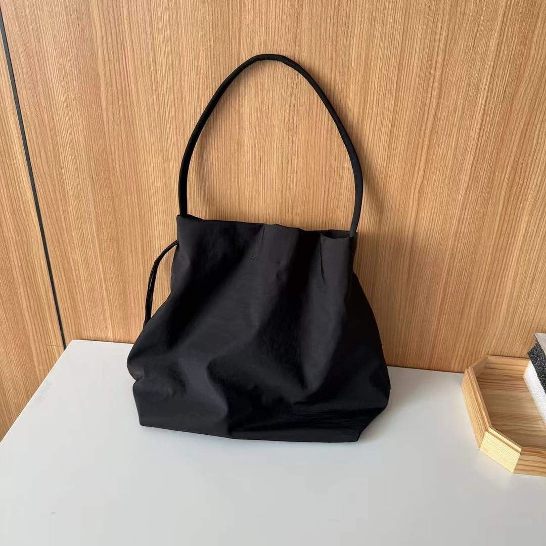 2025时尚休闲百搭潮流小众女款简约设计师款减龄包包5551371