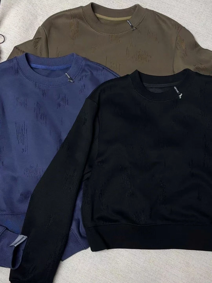 深圳南油QD秋冬新款领口珍珠小药丸三色流苏圆领卫衣119