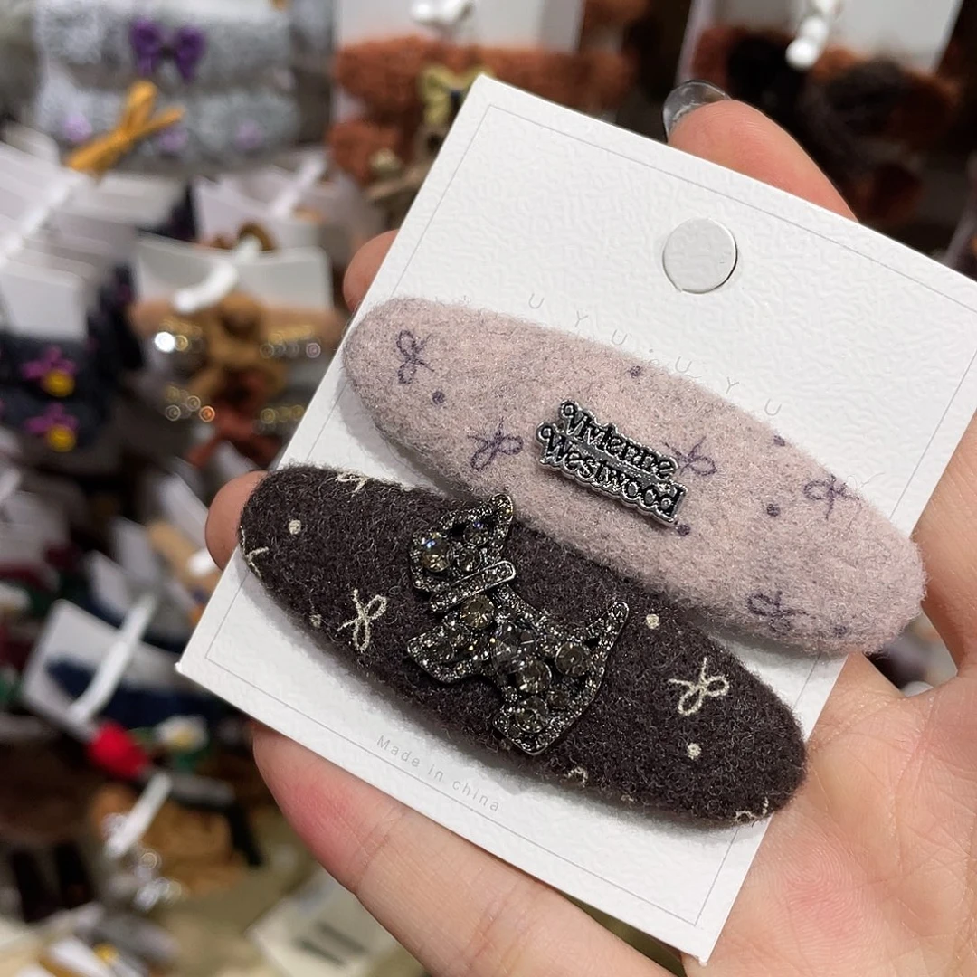 非金属咖粉蝴蝶结小狗