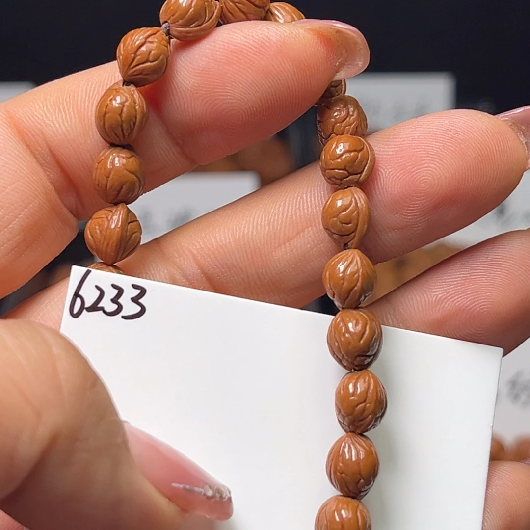 桃核手串小龙纹7左右27成品