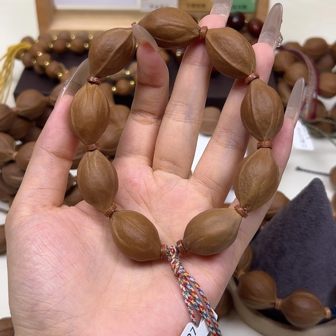 轻***酒手串/手链橄榄核三花18.27