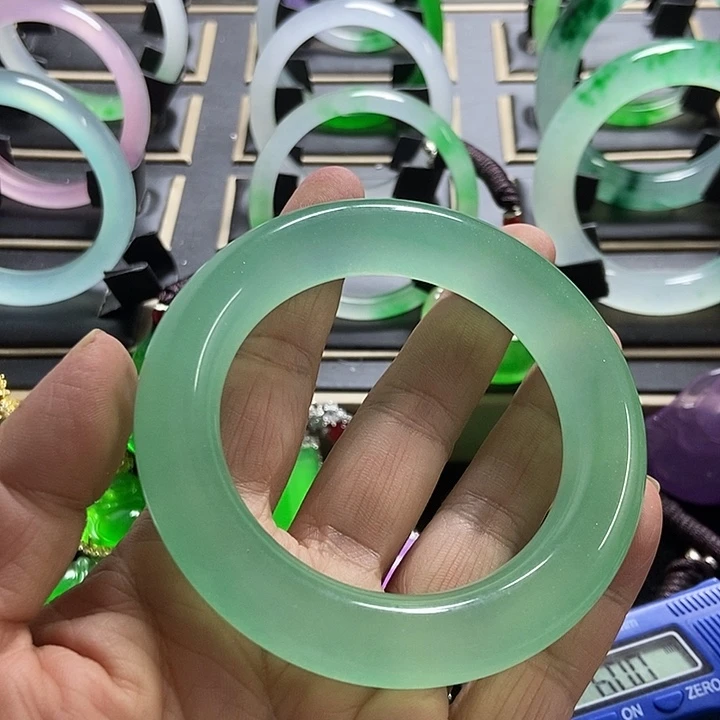 娄***英非金属珐琅绿色毛呢