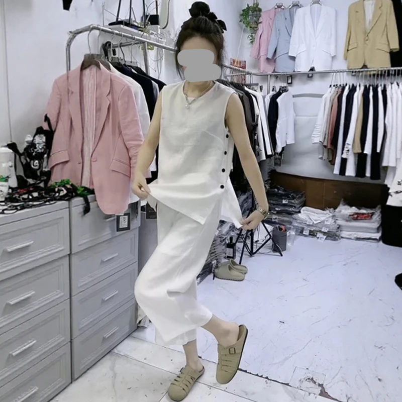 夏日松弛感穿搭盐系轻熟休闲韩系独特绝美藏蓝色无袖两件套装裤女