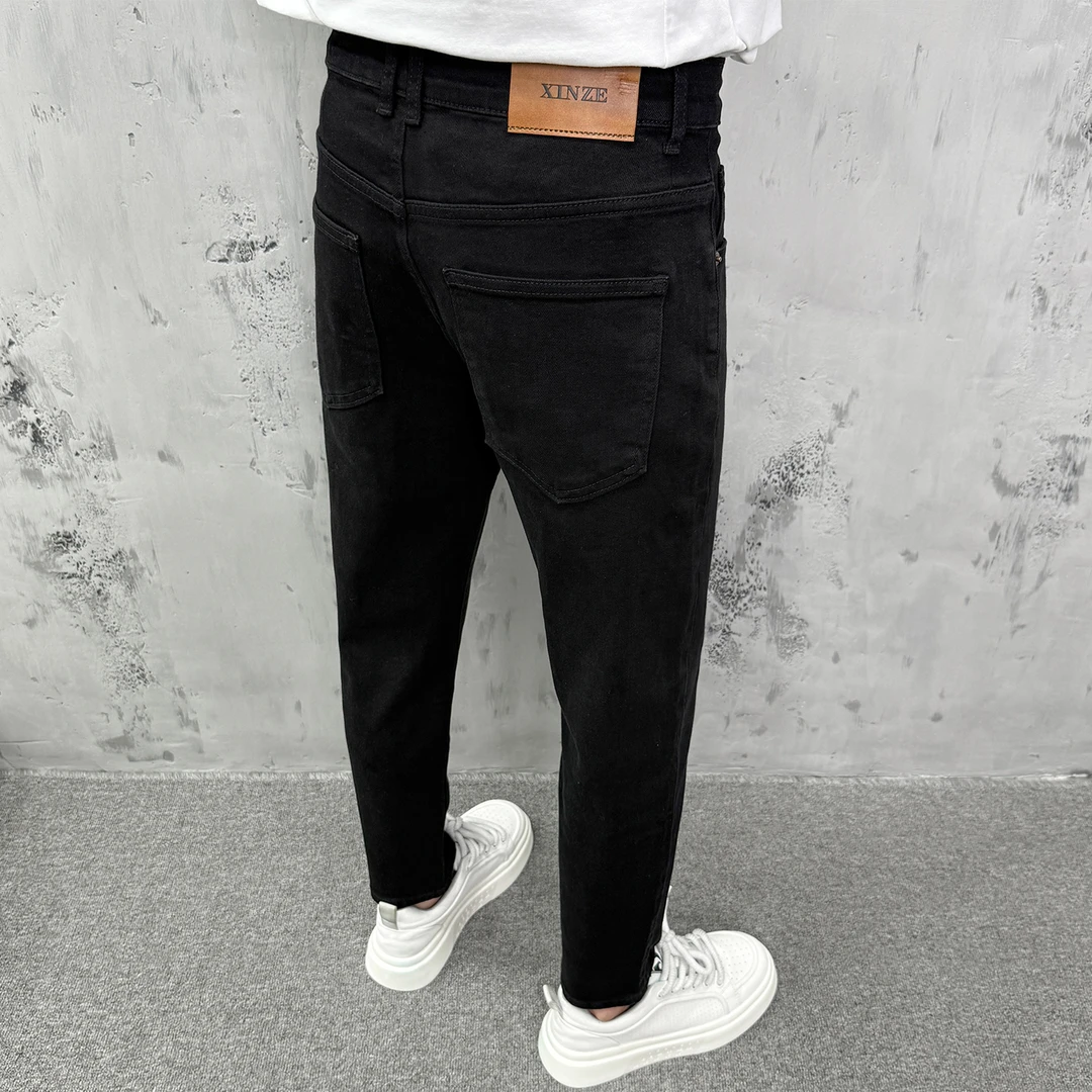 纯黑色牛仔裤男秋季新款简约百搭水洗弹力修身小脚休闲高档九分裤