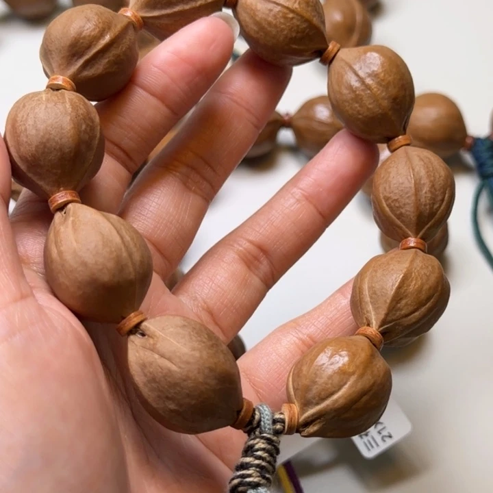 足***以手串橄榄核梅林铁核2026尺寸