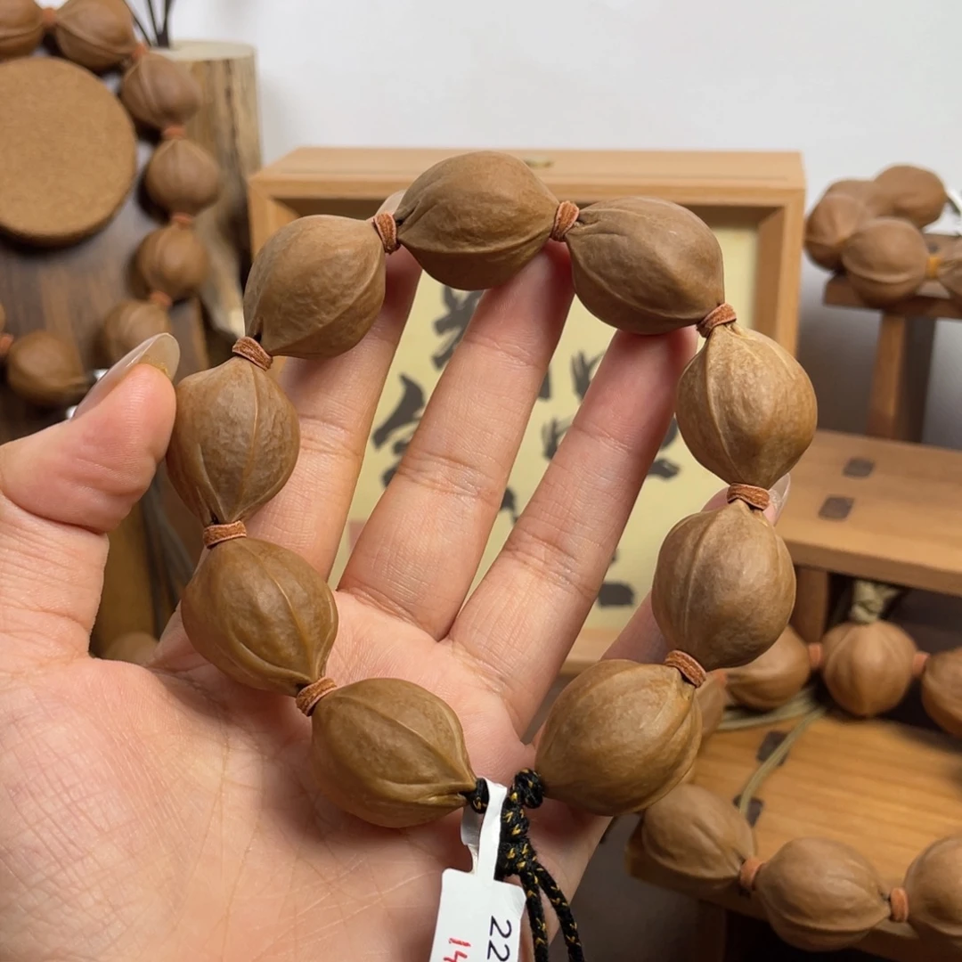用***颂手串/手链橄榄核22*28梅林铁核