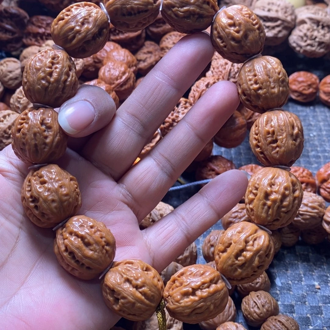 淡***味文玩核桃吊坠粗筋