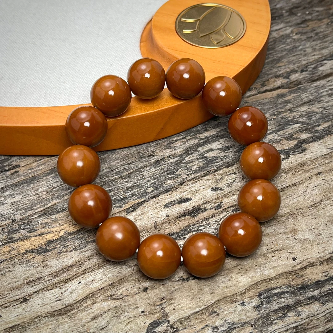 1.7百年老树铁核橄榄核正圆光珠手串无漏精品