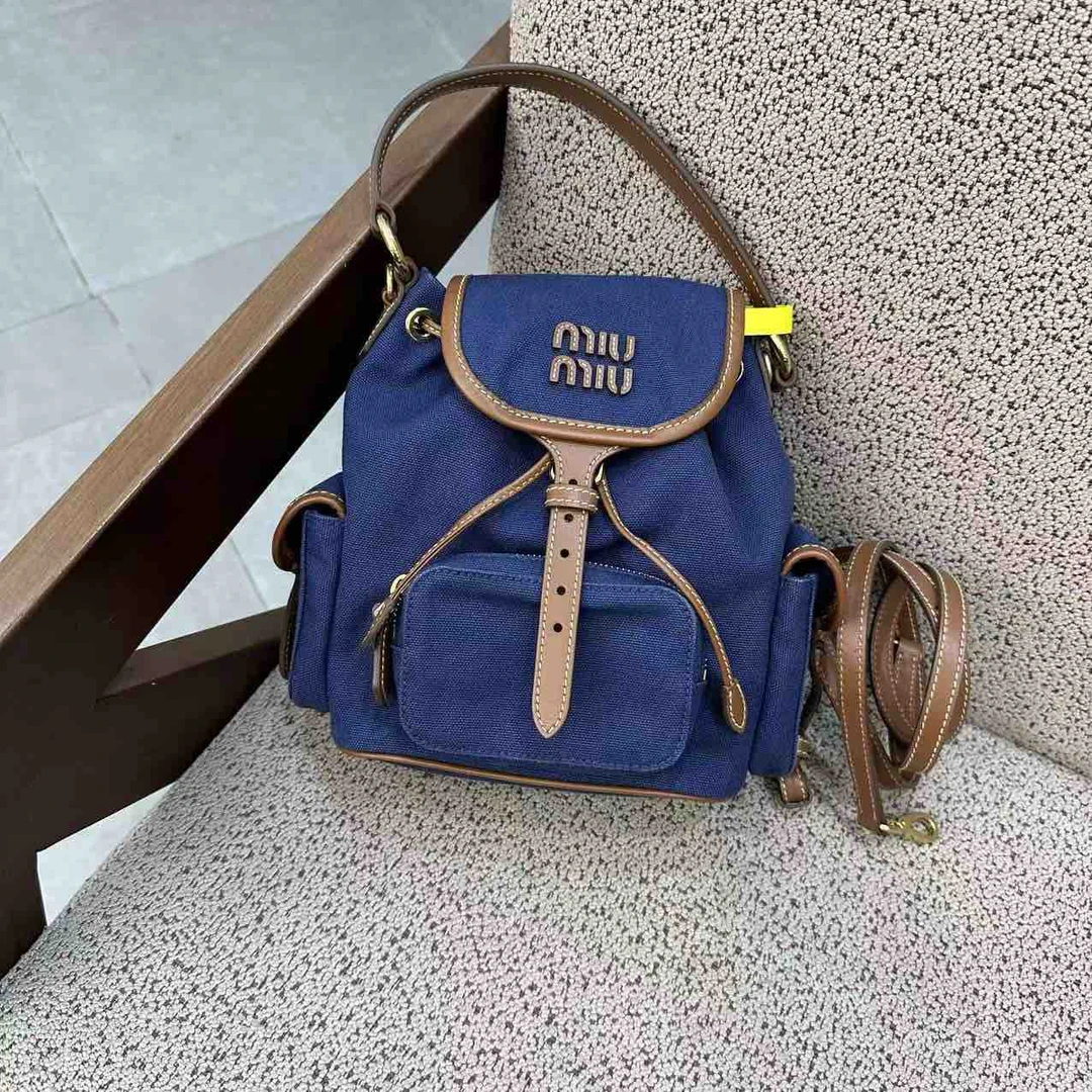 99新 MIU MIU/缪缪 蓝色牛仔双肩包 US591348