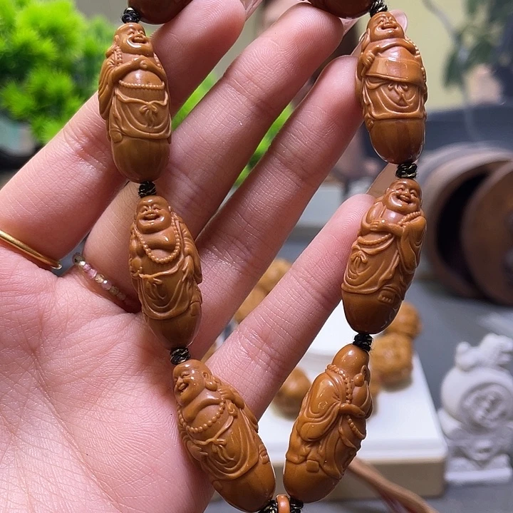 张***爪吊坠橄榄核橄榄核雕