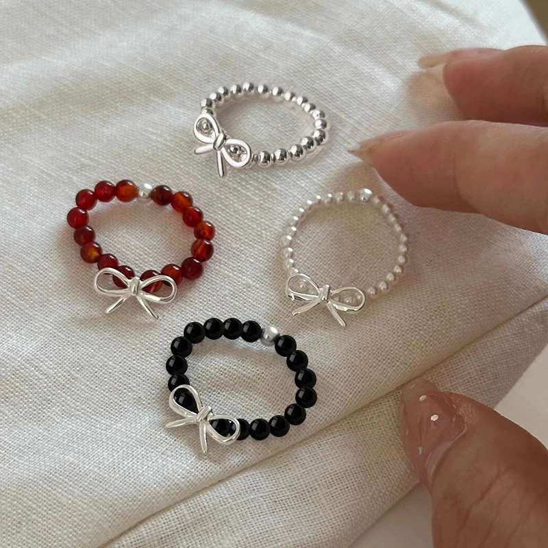 925银戒指 网红s925银蝴蝶结串珠戒指女ins甜美精致手工弹力指环