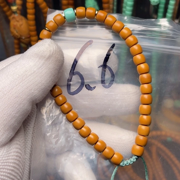 橄榄核吊坠哈哈哈