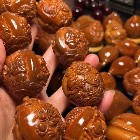 蓦***首橄榄核手串/手链龙财