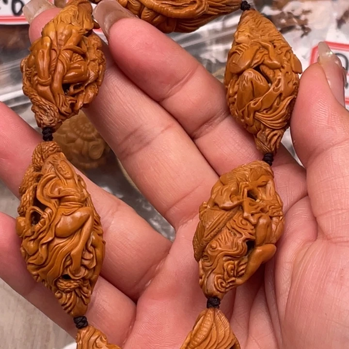 往***梦橄榄核吊坠橄榄核