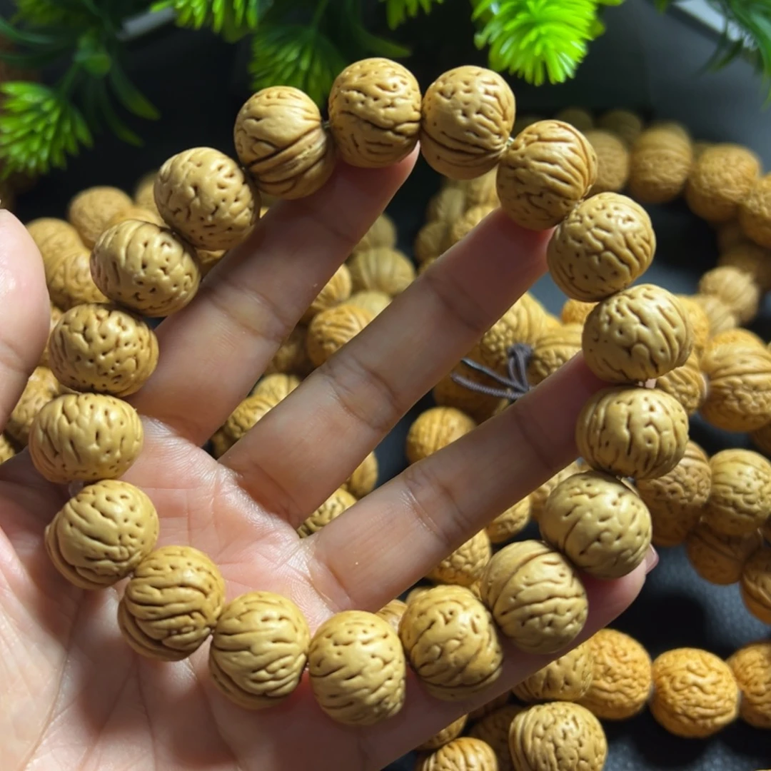 无事牌桃木肉纹元宝桃核手串