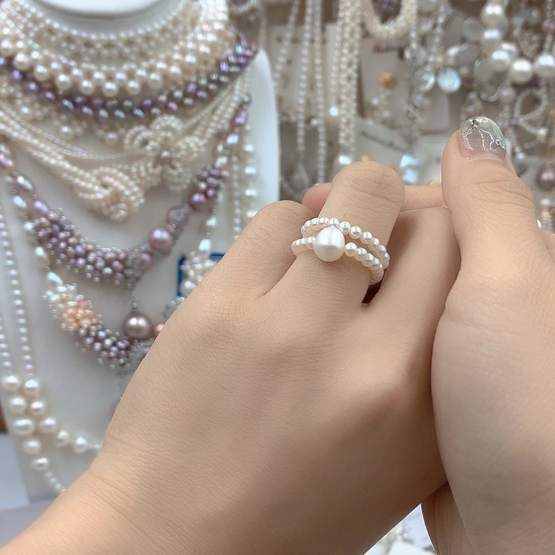 淡水珍珠银S925镶嵌耳饰