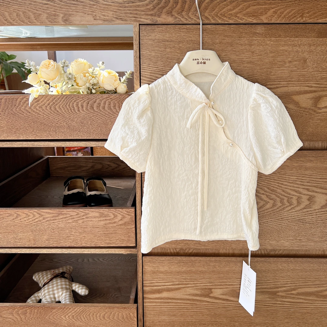 【新中式 上衣】6879(杏色)上衣 女童提花布 蝴蝶结系带泡泡袖上衣