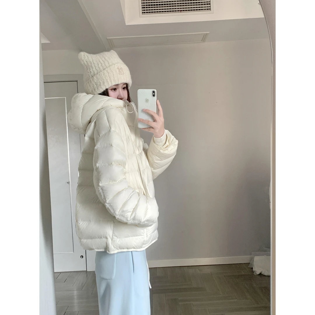 2025年冬季新款白色轻薄棉服女短款百搭宽松保暖连帽排骨棉衣外套