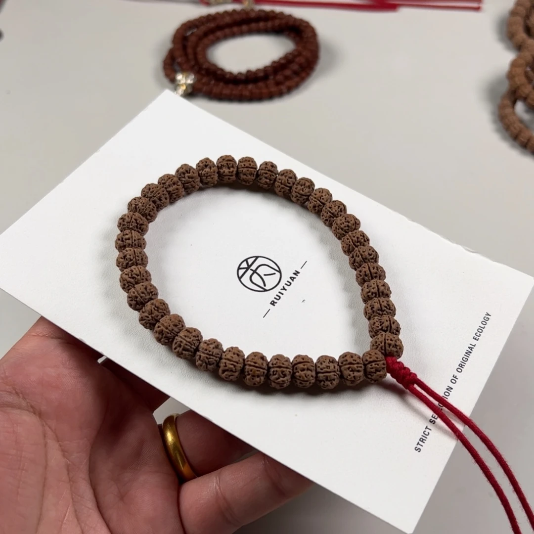 金刚菩提手串R****7凹底梅花五瓣飞碟