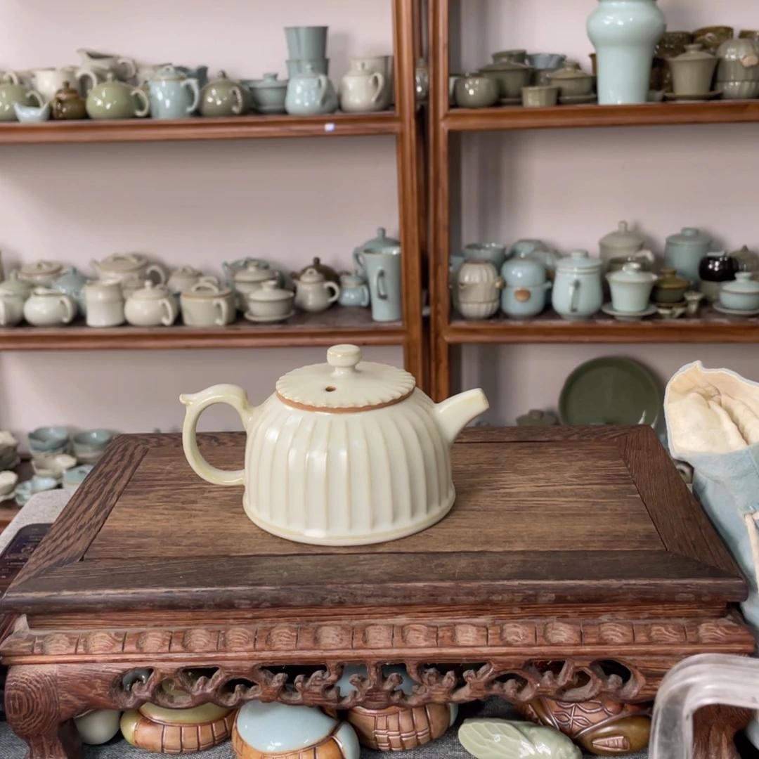 瓷片月白釉支烧青莲壶