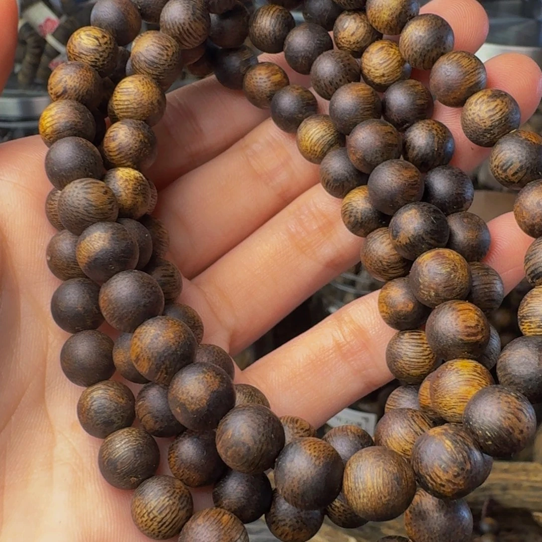 沉香碎屑沉香沉水浮卡八圆珠32克