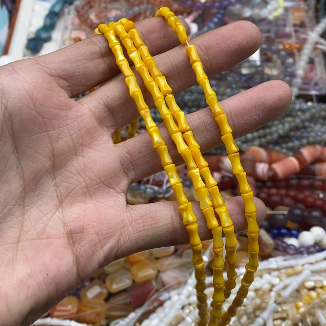 玛瑙/玉髓未镶嵌珠宝半成品一条4×7烤色黄贝壳竹节