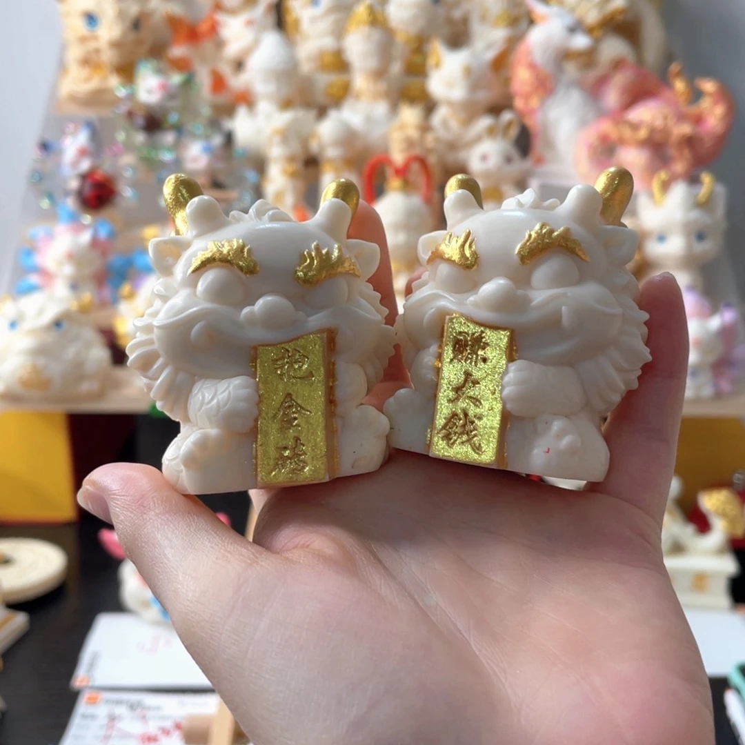 有机玻璃象牙果摆件抱金砖一对车挂