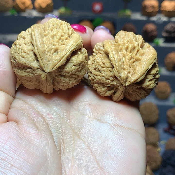 东***读文玩核桃吊坠花中花佛肚