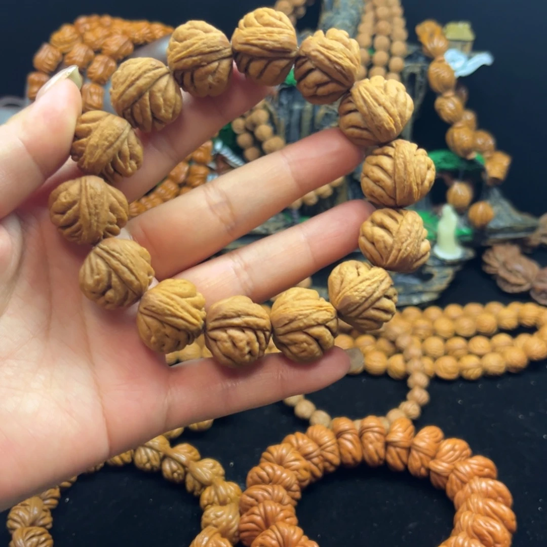 玉***缘手串桃核原皮豹子头手串