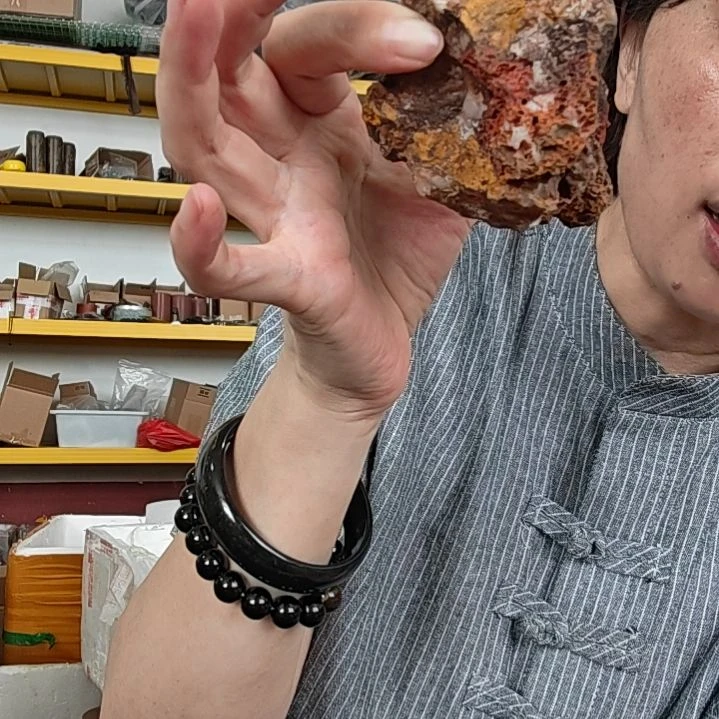 泗水砭石文化消磁石手把件