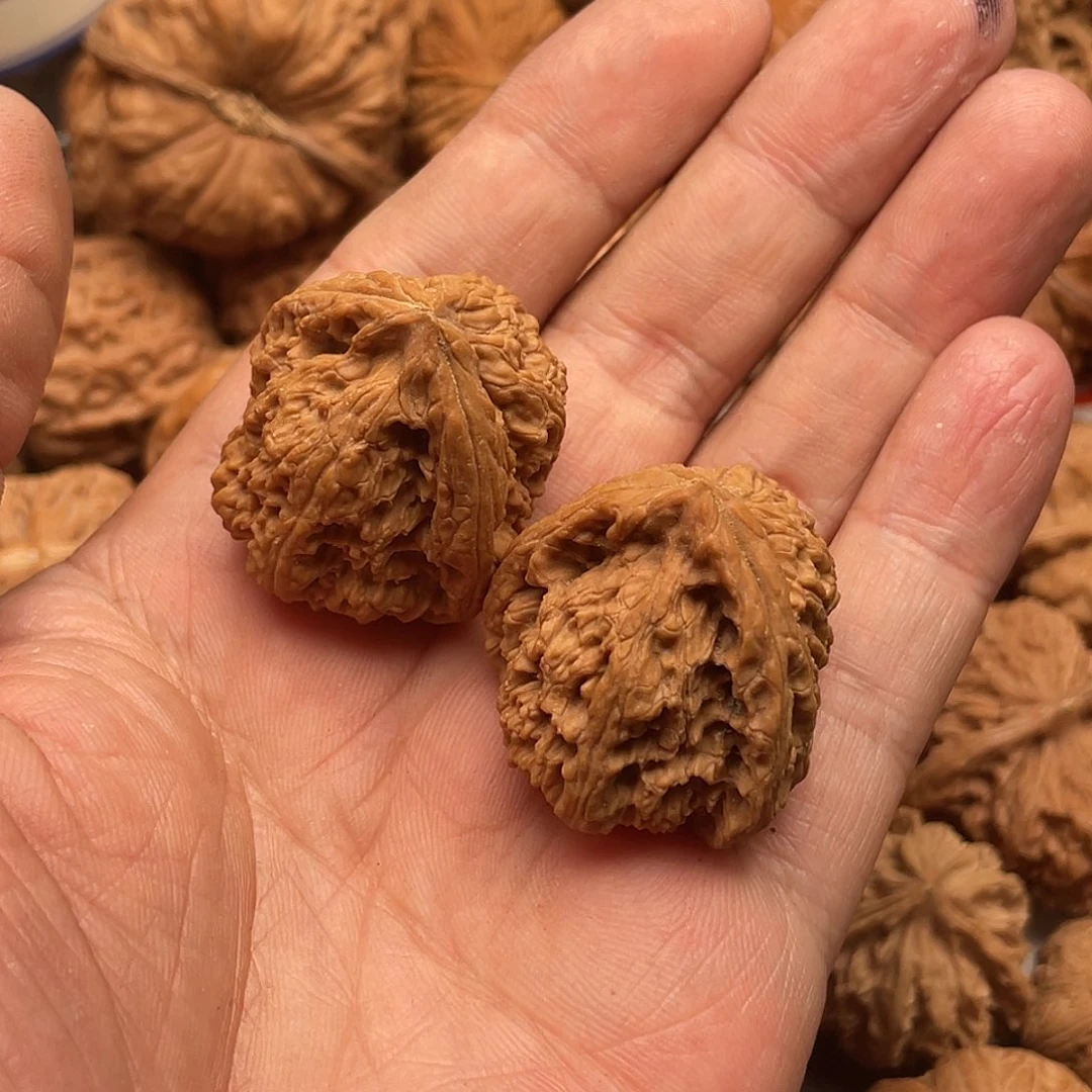 文玩核桃吊坠卡****鼻南疆