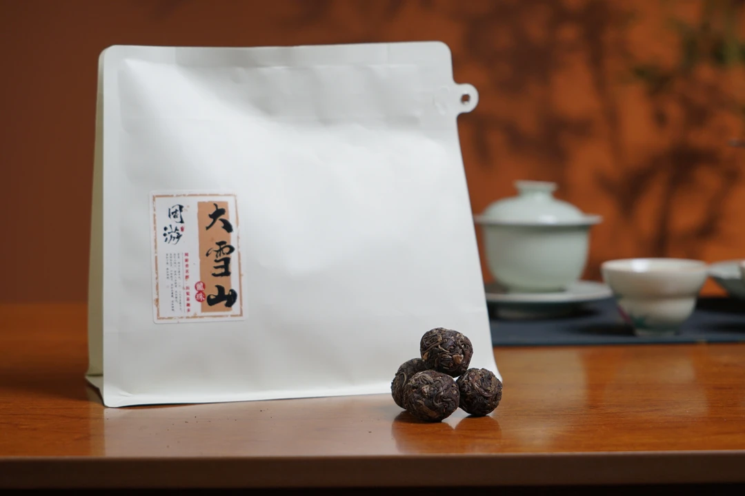 大雪山龙珠250克2015年普洱生茶