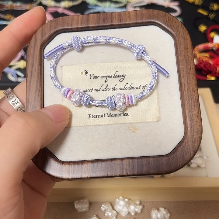 小***点足银布艺紫色手绳