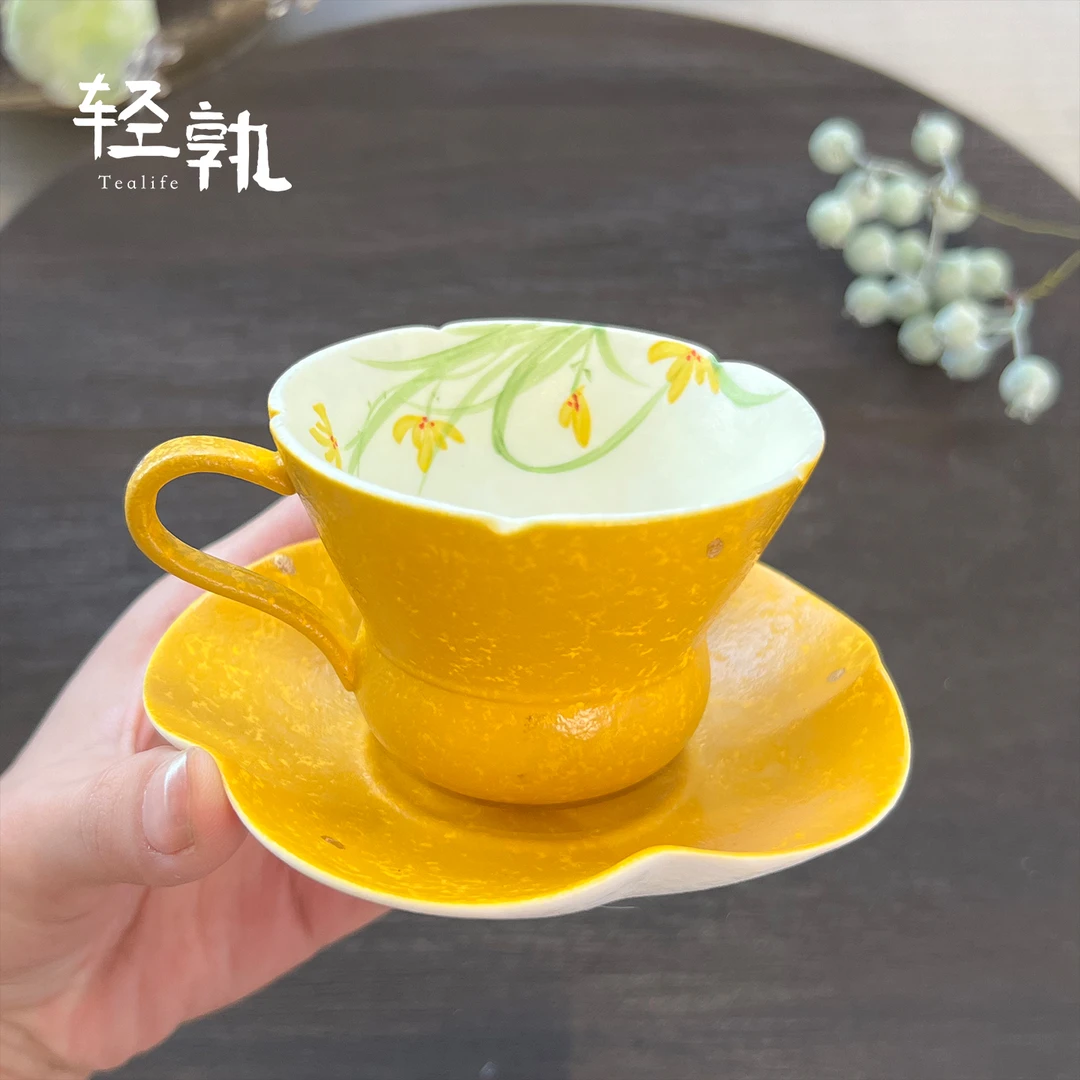 轻孰柠黄手绘兰花花口把手杯中式陶瓷家用防烫喝茶品茗杯功夫茶具