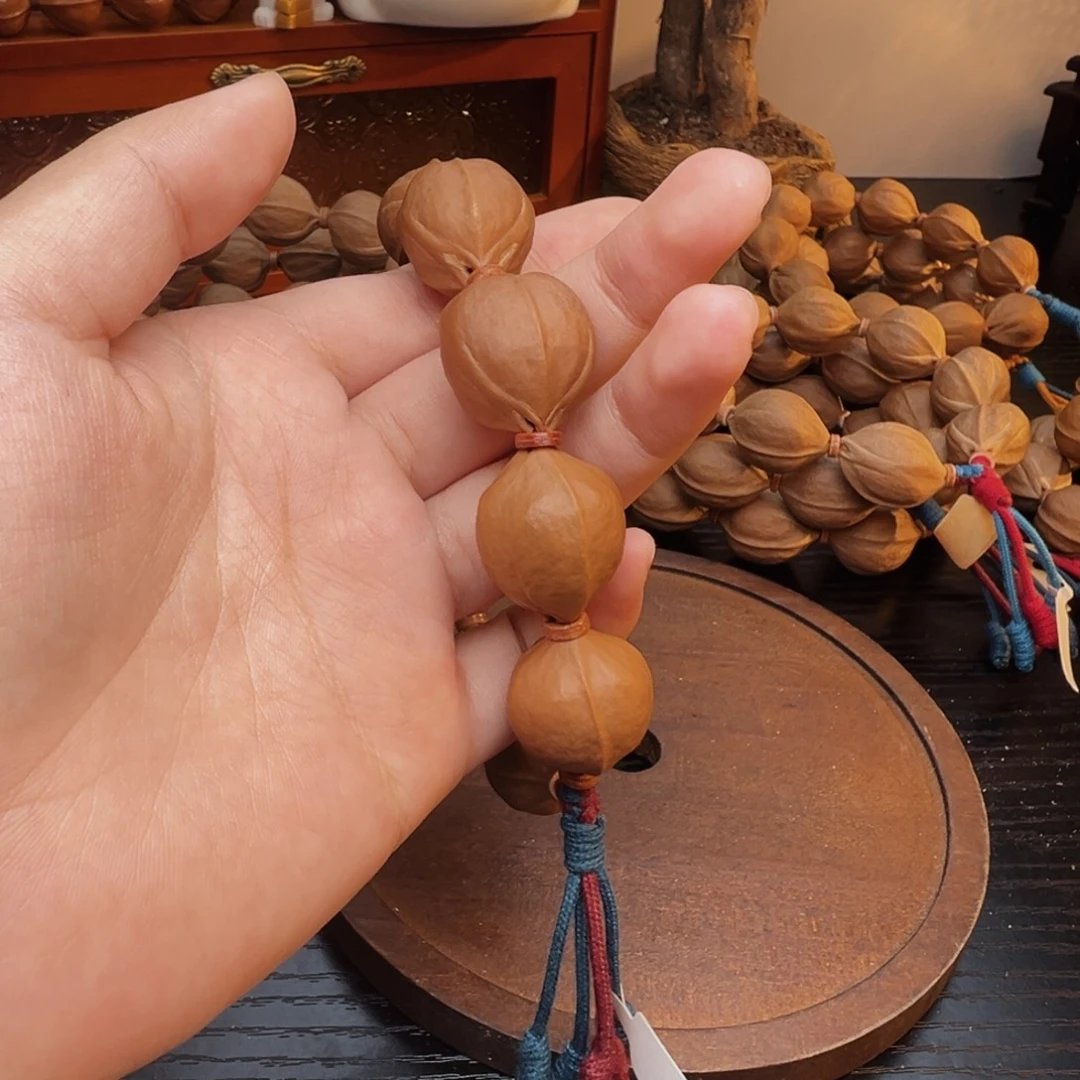 我***能橄榄核吊坠梅林铁核1926 20颗鲨鱼背
