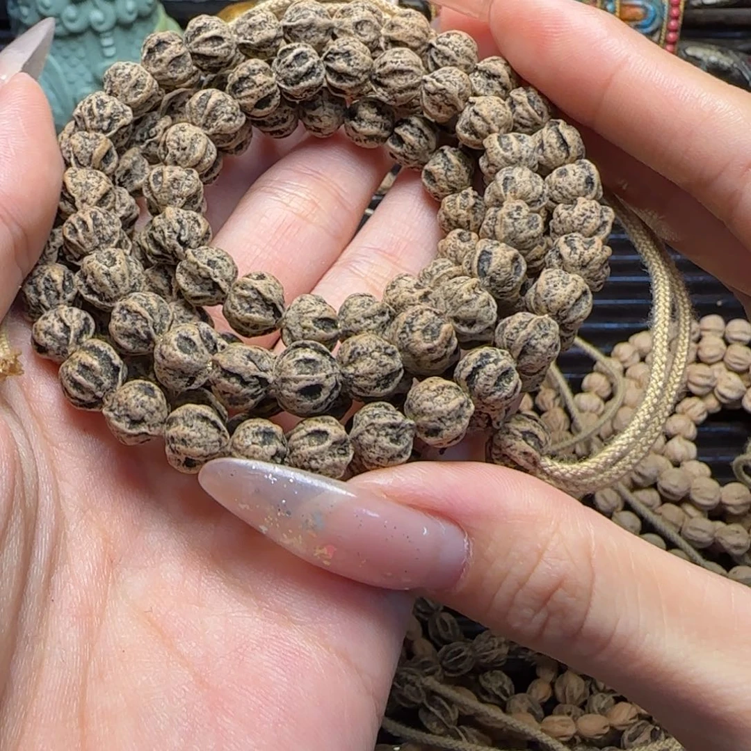 甚***酒柏香籽/百香籽吊坠