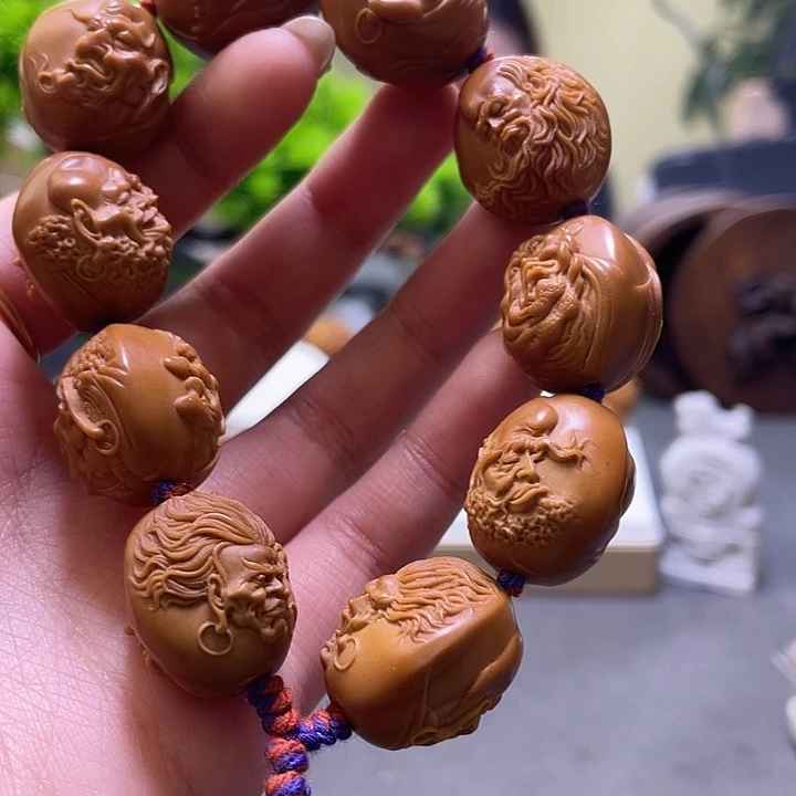 向****橄榄核吊坠橄榄核雕