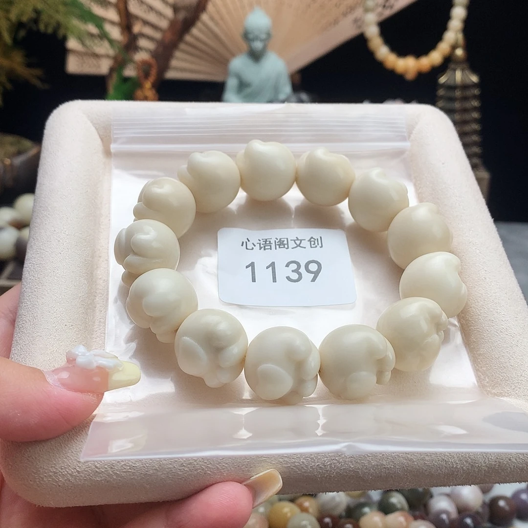 ****周手串菩提根/象牙果1139