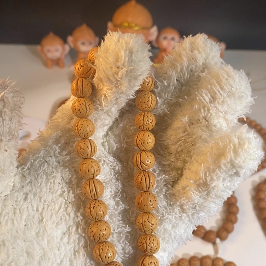 淡***然桃核吊坠黄桃小手持