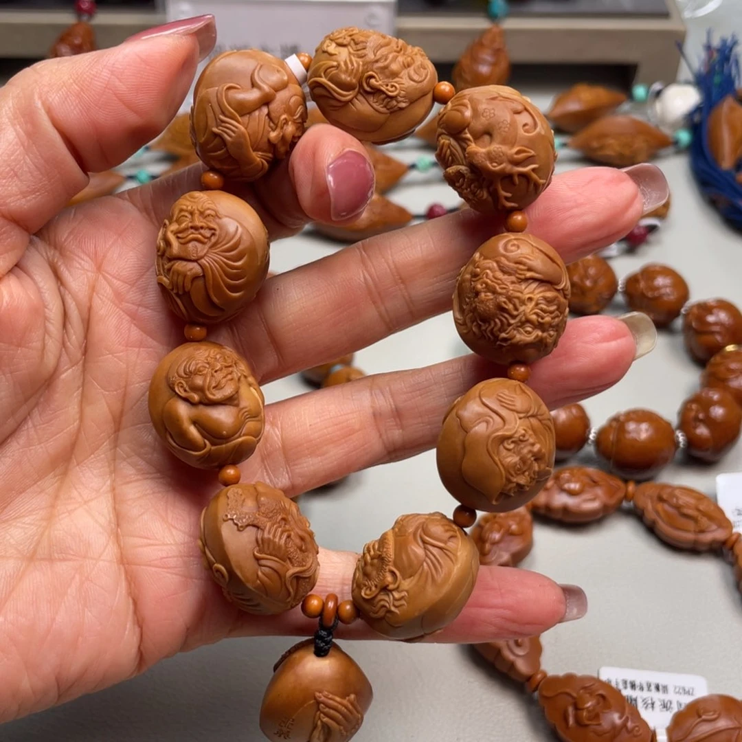 橄榄核手串青***长橄榄核雕工艺