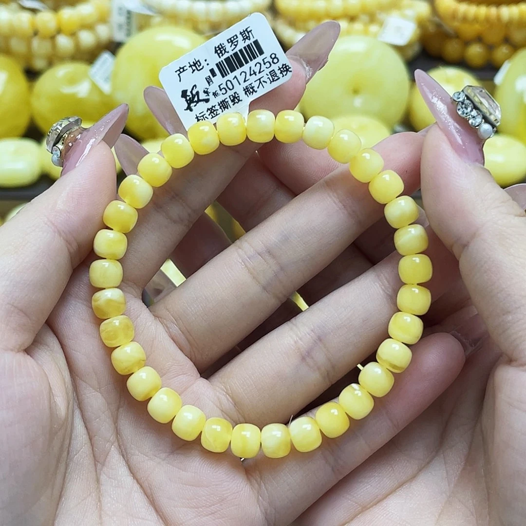 裸石琥珀未镶嵌6.5*5.5mm金白溶洞老型手串微瑕