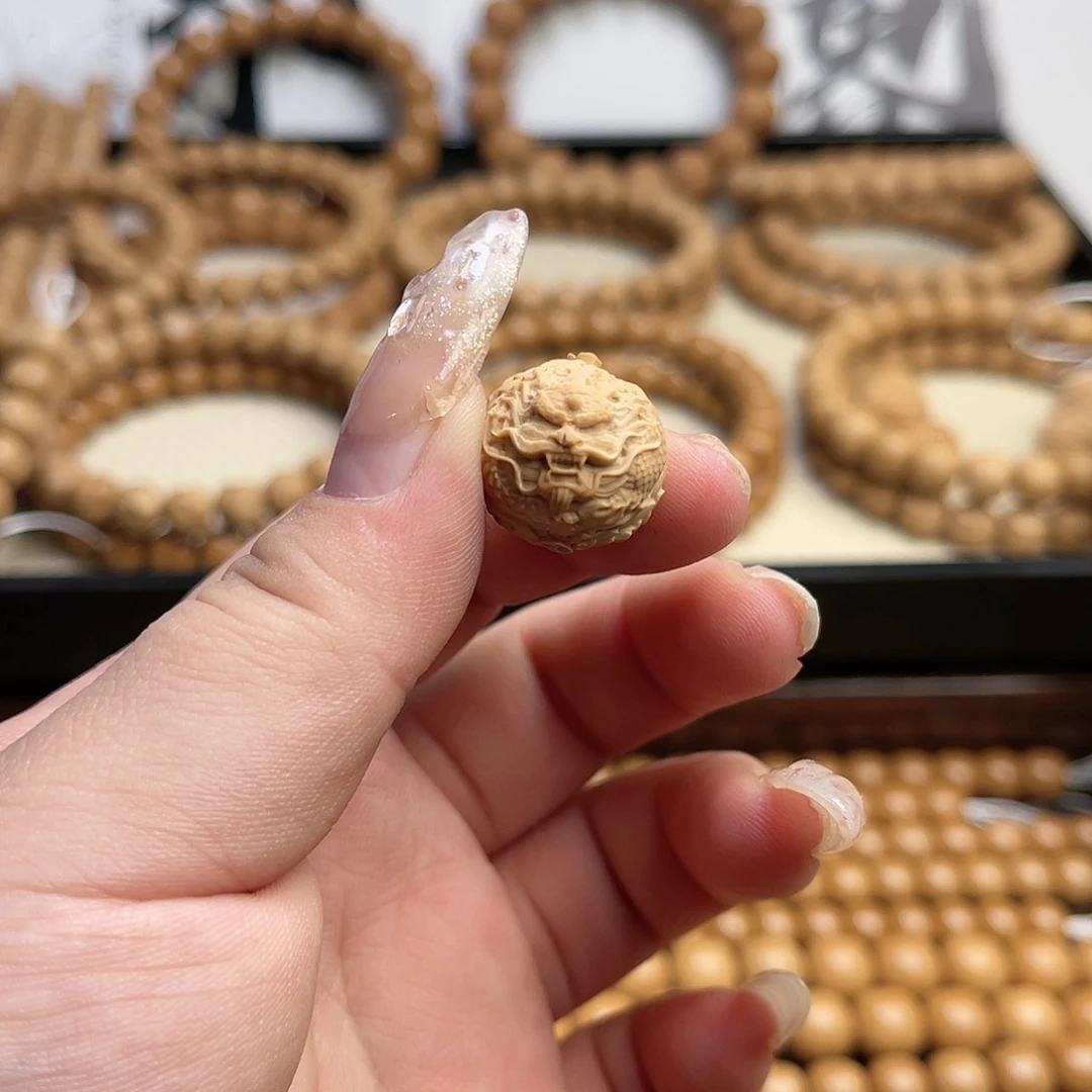 境界猴头雕刻单籽龙珠