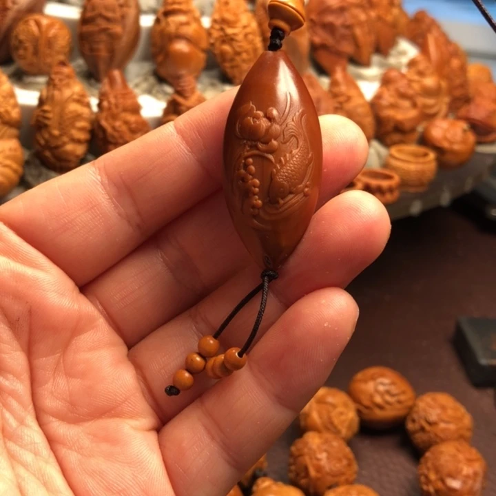 是***啊吊坠橄榄核橄榄核雕刻的手把件