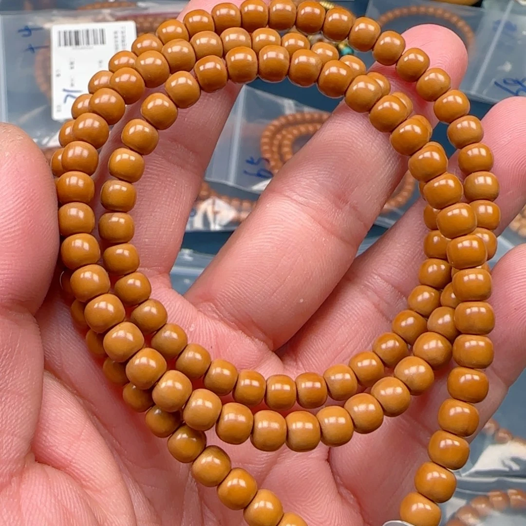 喜***子手串橄榄核老挝SS级核尖极限弧尺寸6.2×120颗全无白