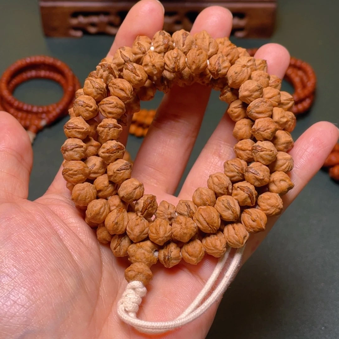 柏香籽/百香籽手串红牙横打龅牙口长串
