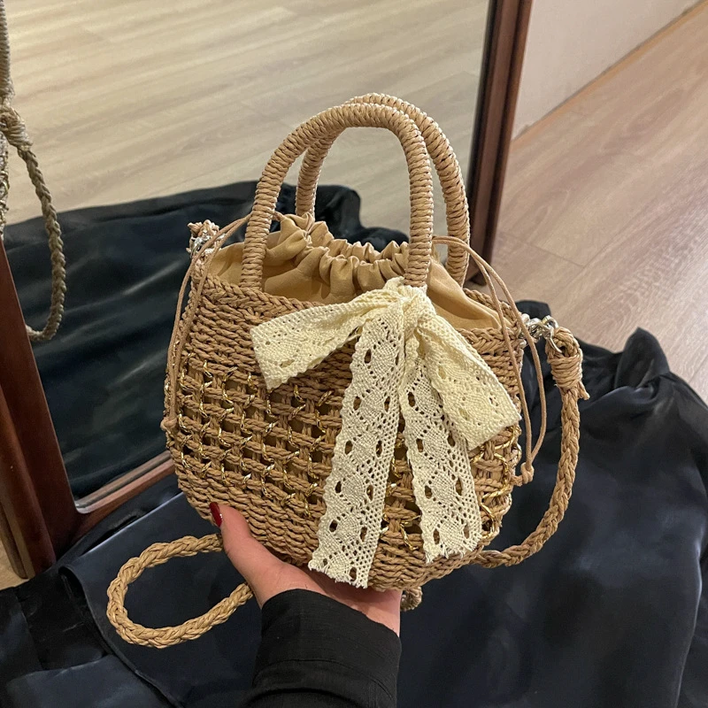 小众设计海边度假风手提草编包包女生2025新款夏季单肩镂空沙滩包