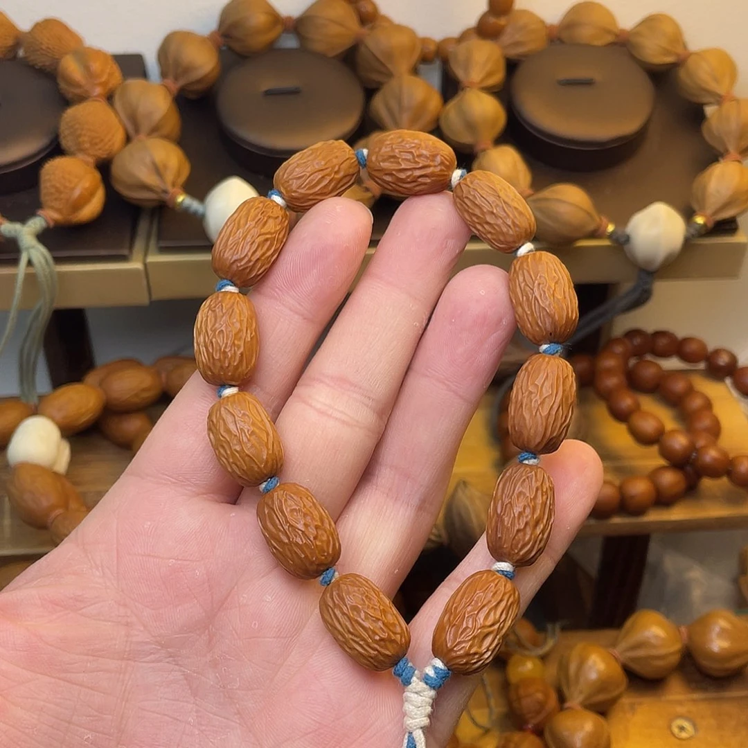 缘***随手串/手链橄榄核1.2小枣